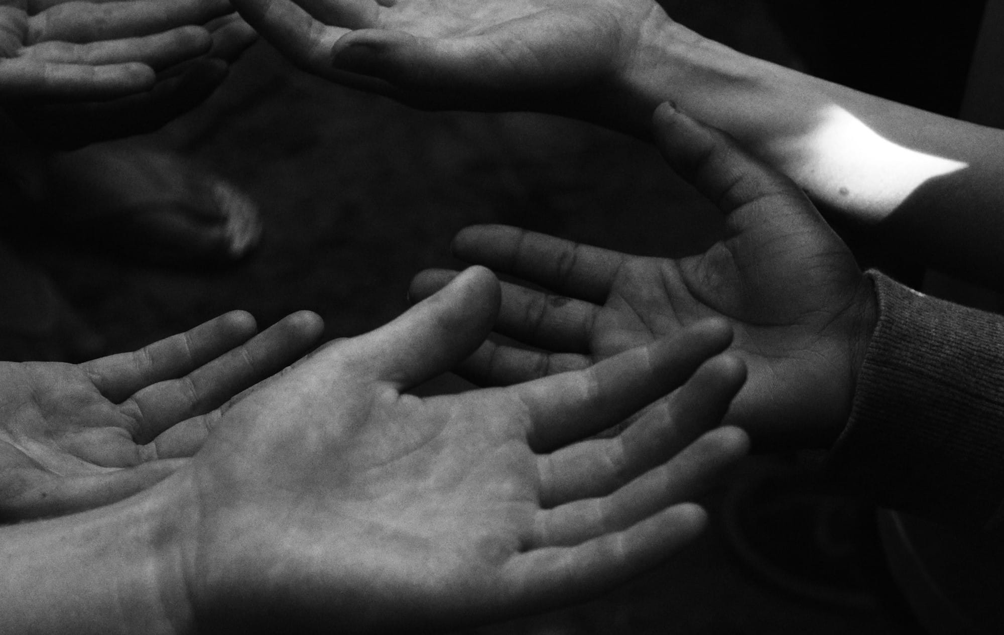 People hands in grey shades